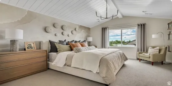 Vaulted ceiling featuring exposed white-painted beams and a contemporary linear chandelier. This home is To Be Built and the picture is of a previous home.