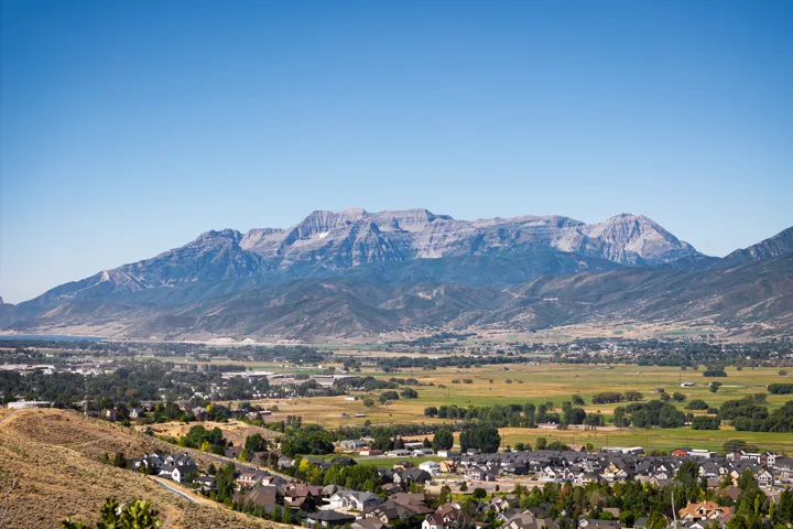 Expansive mountain range backdrop for a residential neighborhood