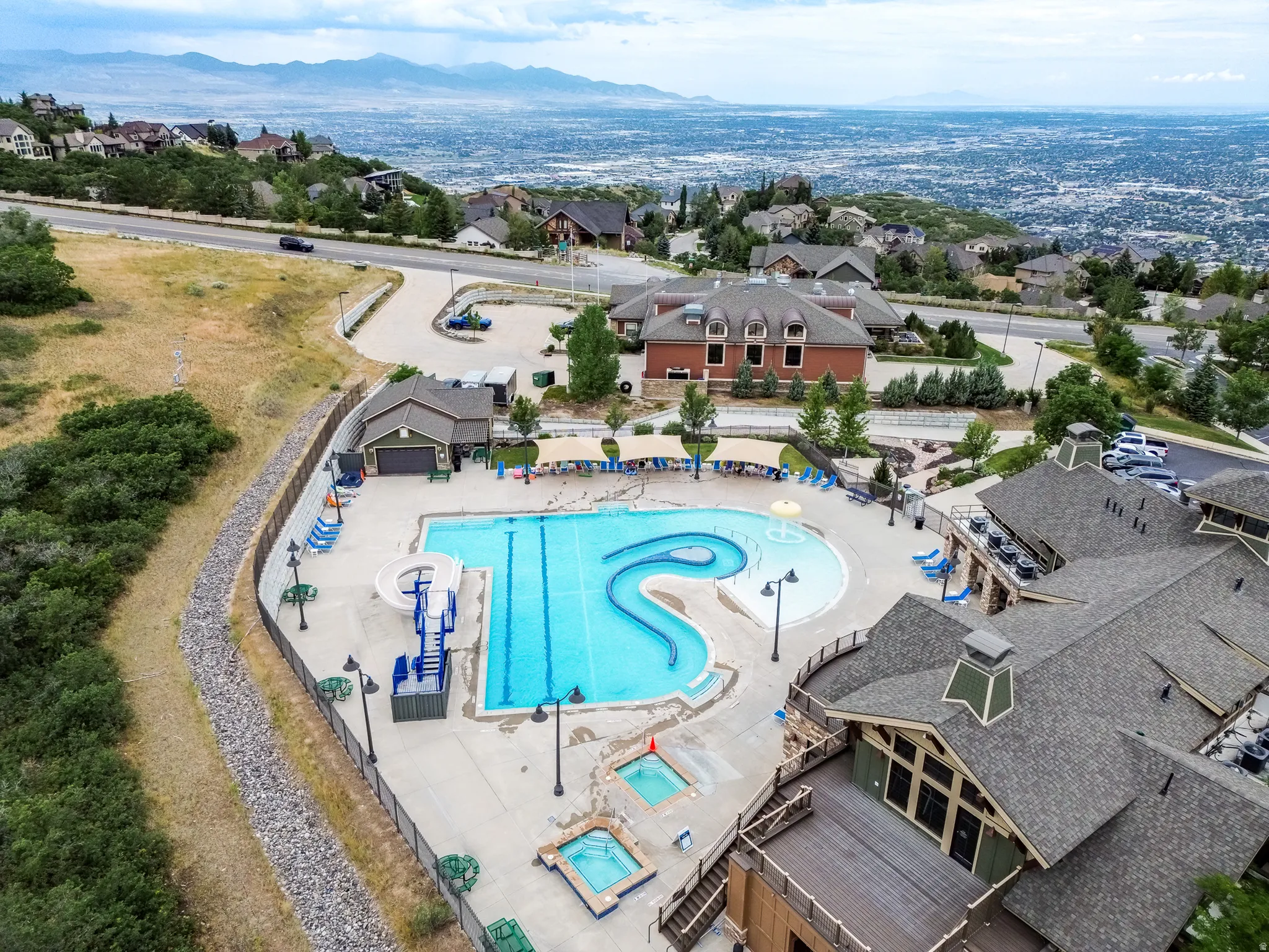 Suncrest pool with a slide and lazy river!