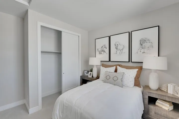 Neutral tone walls complemented by light-colored carpeting