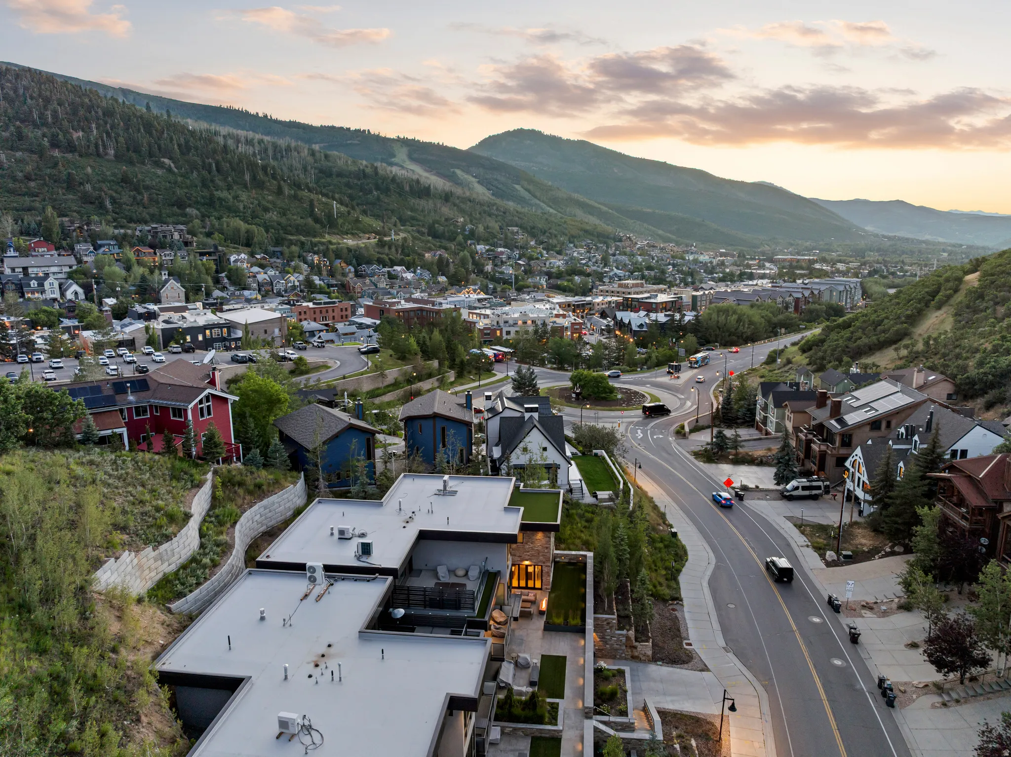 Elevated aerial perspective showcasing a mountainous landscape and surrounding architecture
