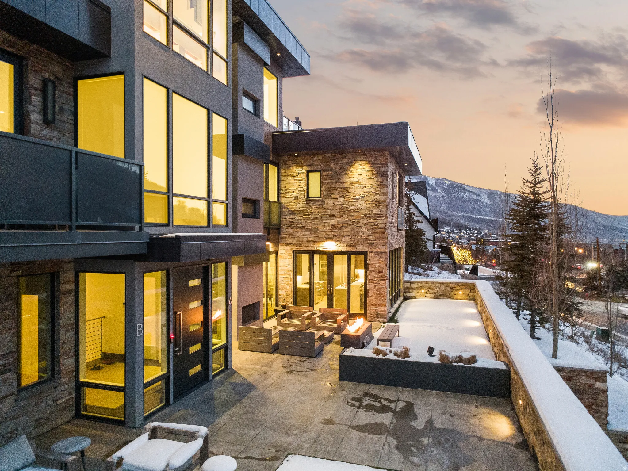 Exterior featuring modern architecture with stone and stucco finishes