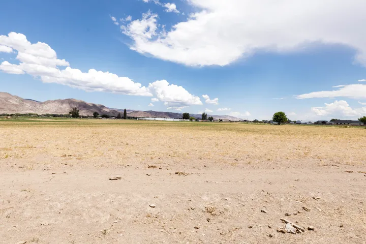 Expansive undeveloped land featuring a broad, level terrain