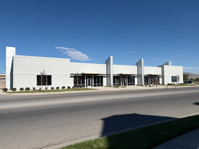 Modern commercial building with a light-colored facade