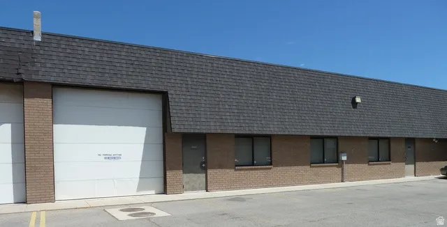 Commercial building with a prominent overhead door