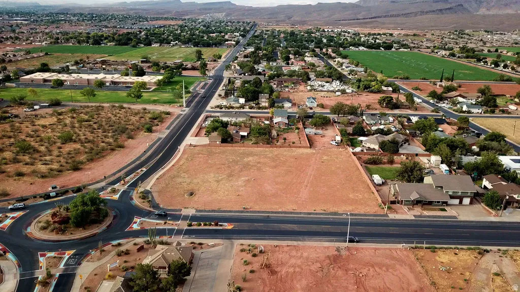 Expansive vacant land parcel featuring direct road frontage and a flat topography
