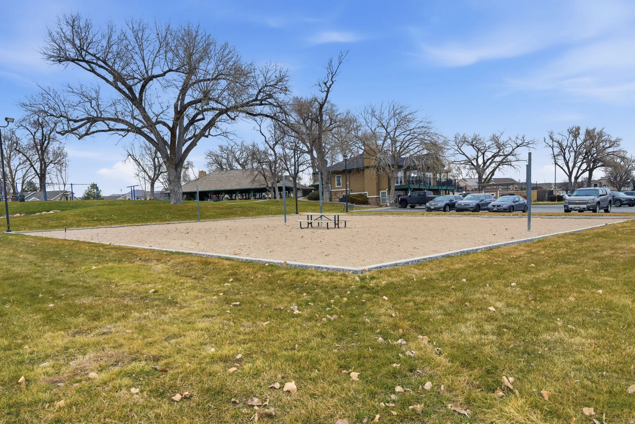 Sand court with perimeter curbing