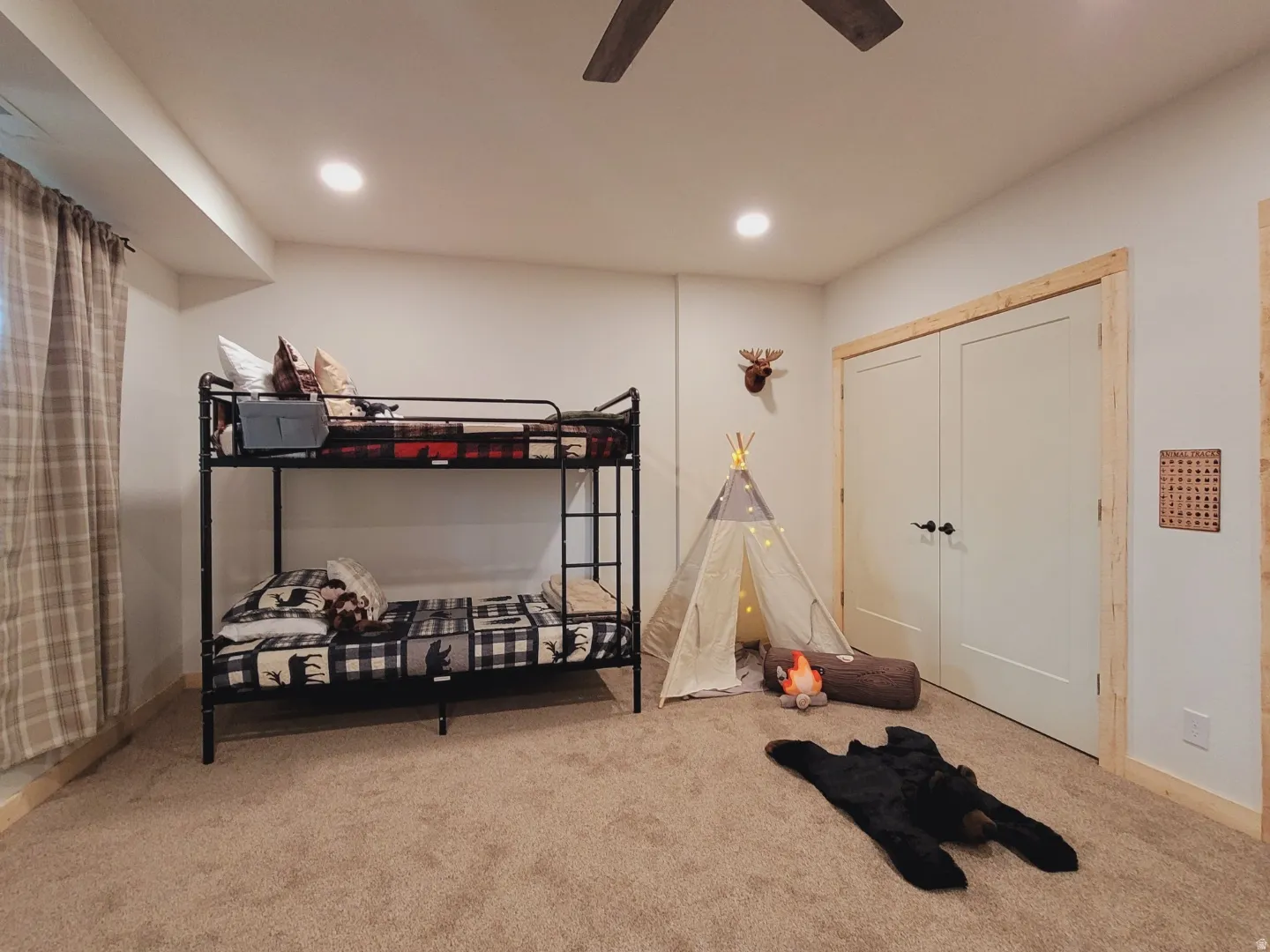 Carpeted room featuring recessed lighting and a ceiling fan