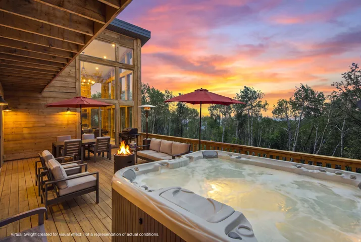 Expansive wood deck with a built-in hot tub