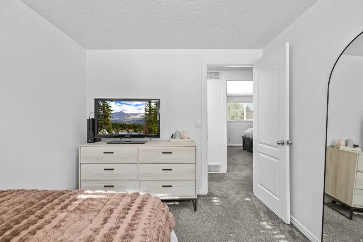 White walls with textured ceilings throughout