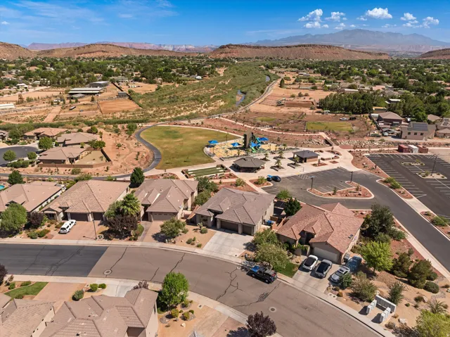 Aerial perspective showcasing a residential community with abundant green spaces
