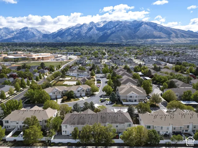 Neighborhood panorama with snow-capped mountain backdrop