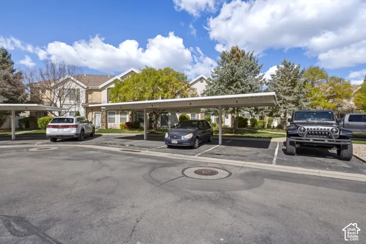 Dedicated covered parking spaces with asphalt surfacing
