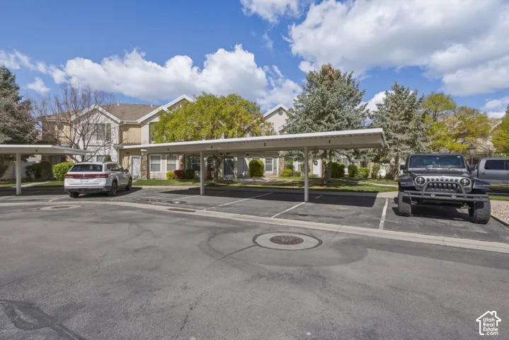Carport parking spaces with assigned numbering offer covered parking