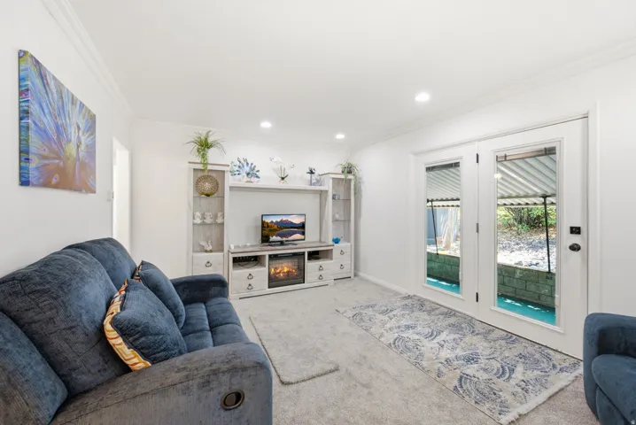 Bright interior space featuring white walls and recessed lighting