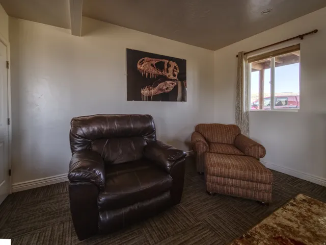 Neutral wall paint with white baseboards and trim