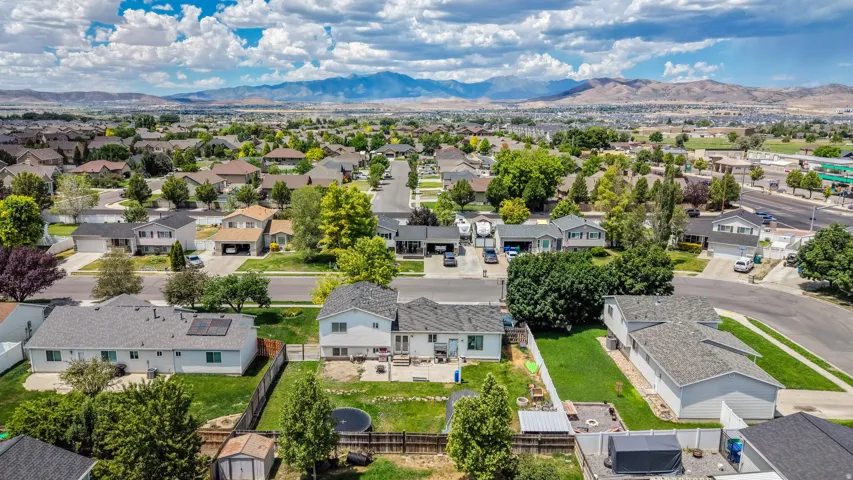 Expansive residential area featuring numerous single-family homes with paved streets and mature landscaping