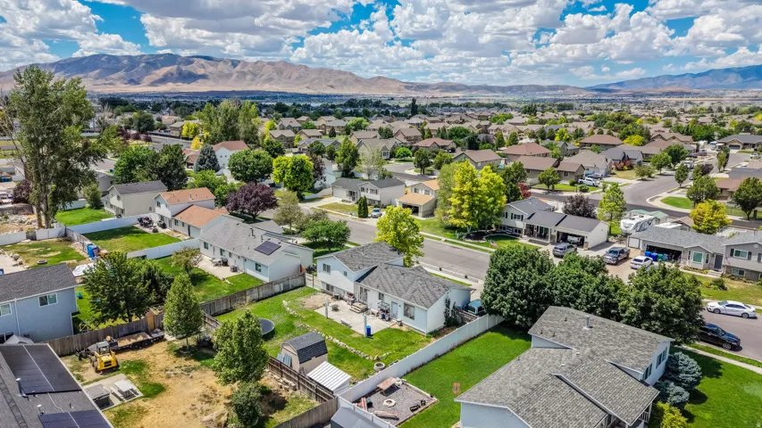 Expansive neighborhood setting featuring numerous single-family residences with varied architectural styles