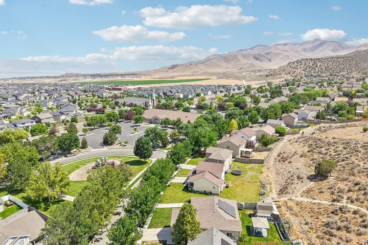 Expansive aerial perspective showcasing a residential development with varied housing styles