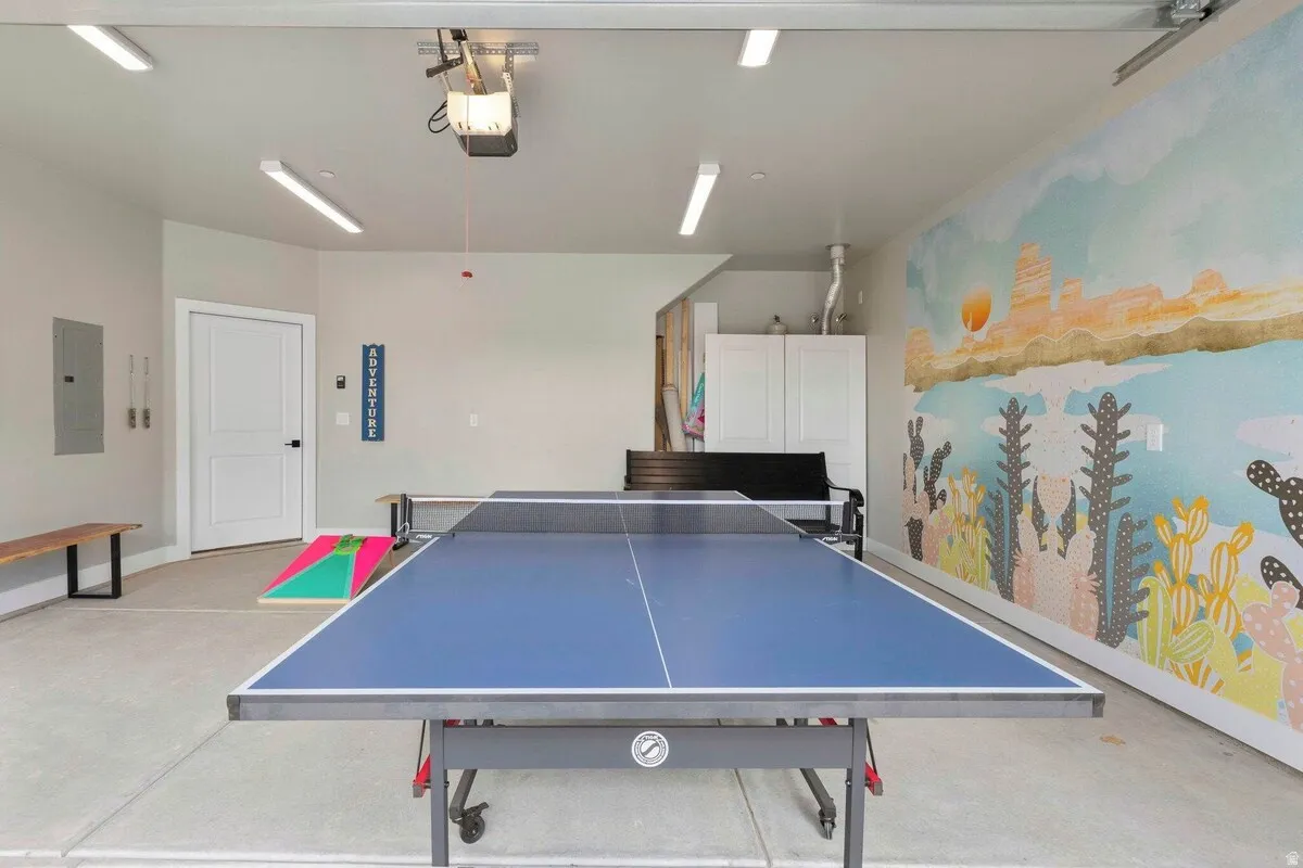 Spacious garage with light gray walls and concrete flooring