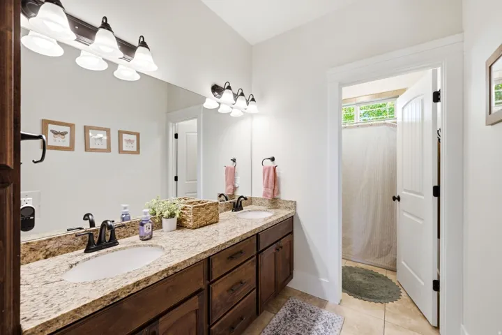 Dual vanity with granite countertop and integrated sinks