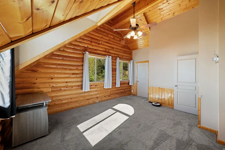 Vaulted wood-paneled ceilings with exposed beams