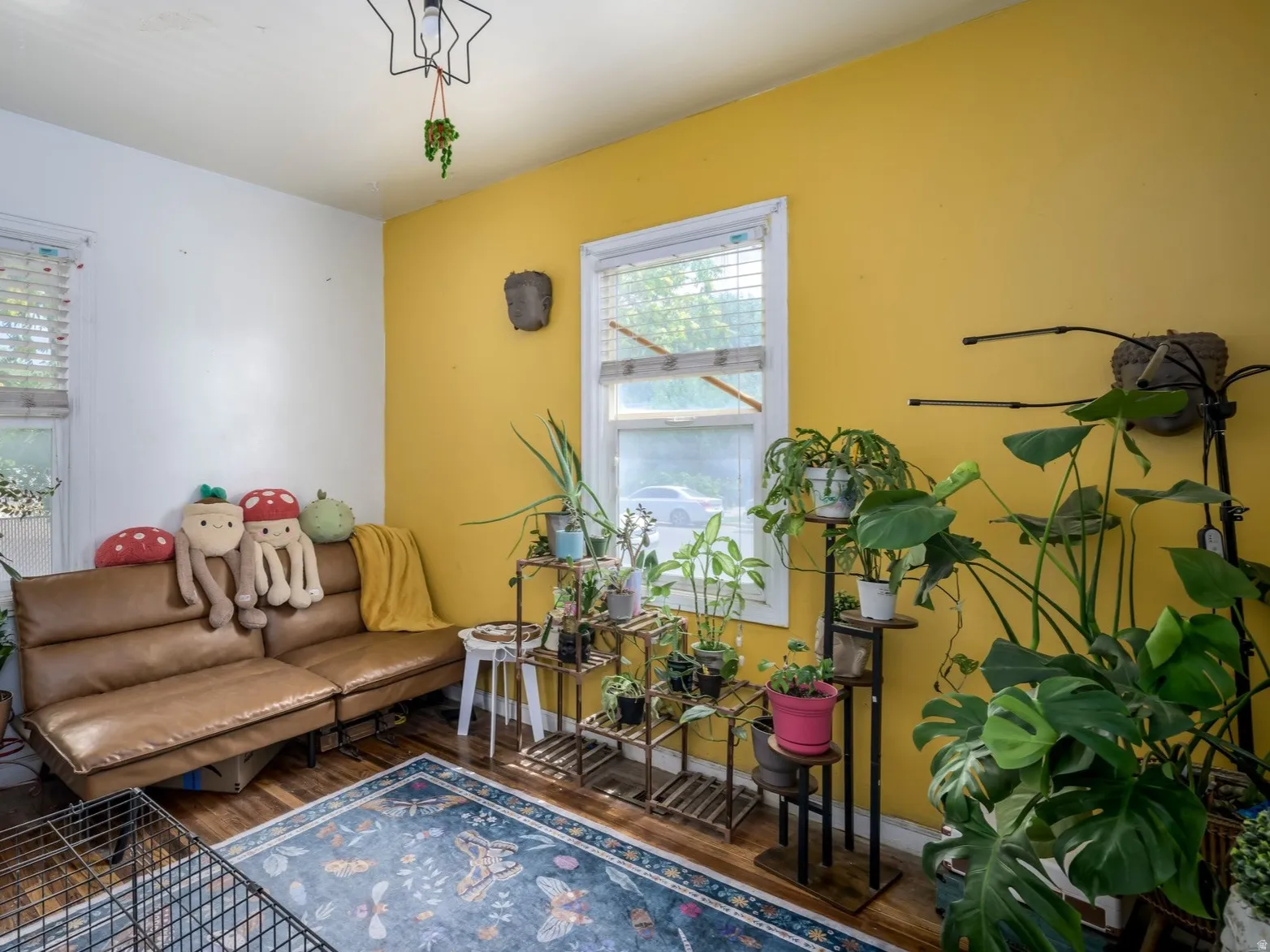 White walls with a single accent wall in a vibrant yellow hue