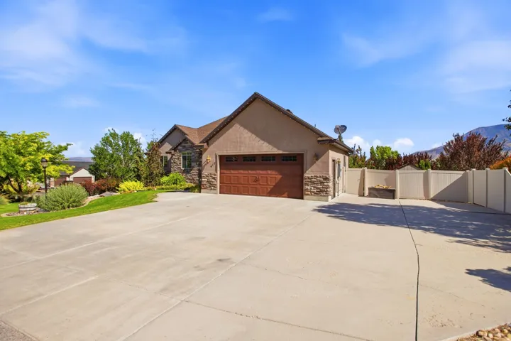 Concrete driveway offering ample parking