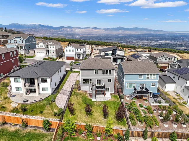 Expansive residential neighborhood featuring diverse architectural styles and a mountain backdrop