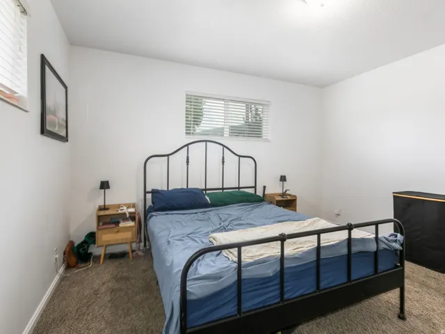 Primary bedroom with lots of natural light.
