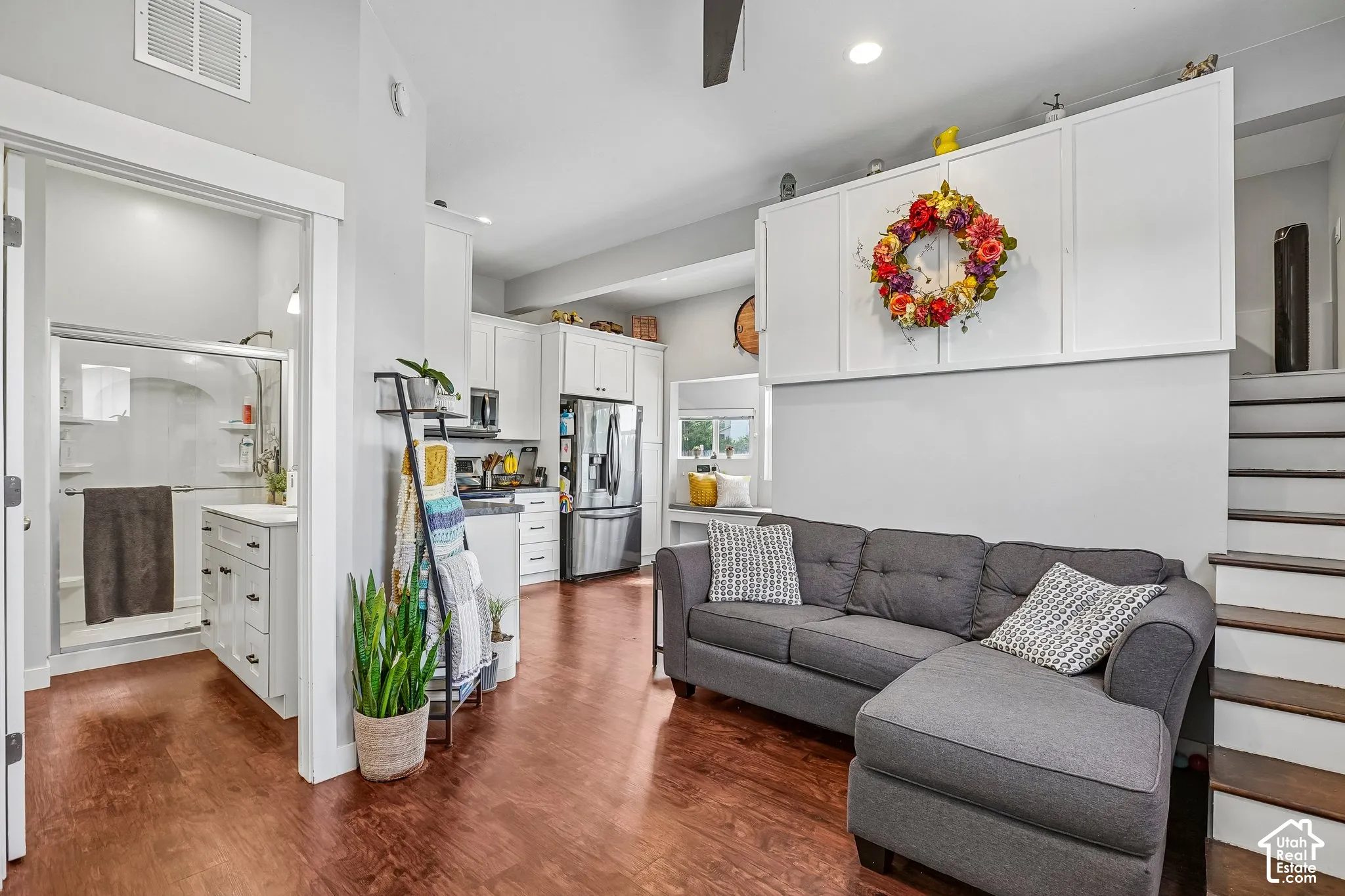 Studio Living Room with Stairs to Loft Bed