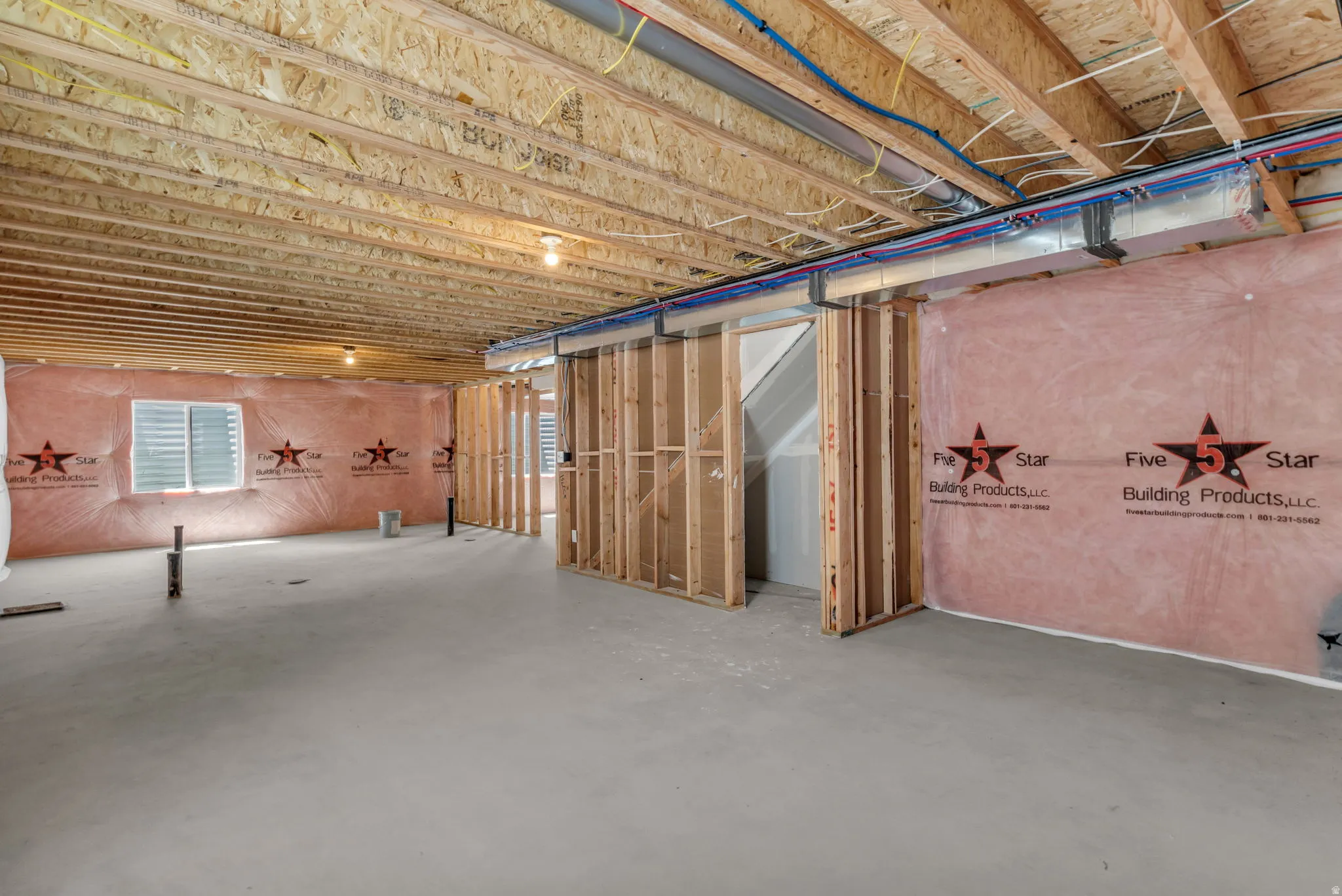 Unfinished basement with potential for two bedroom ADU, rough plumbed for a kitchen and washer.