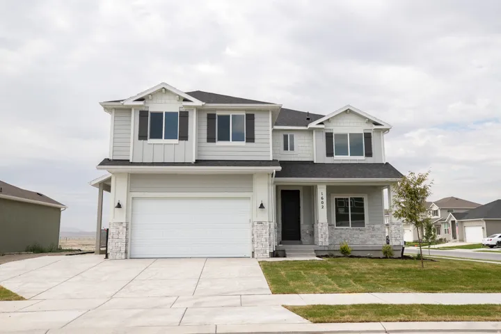 Redwood Elevation C with extended porch, exterior ADU entrance, with parking