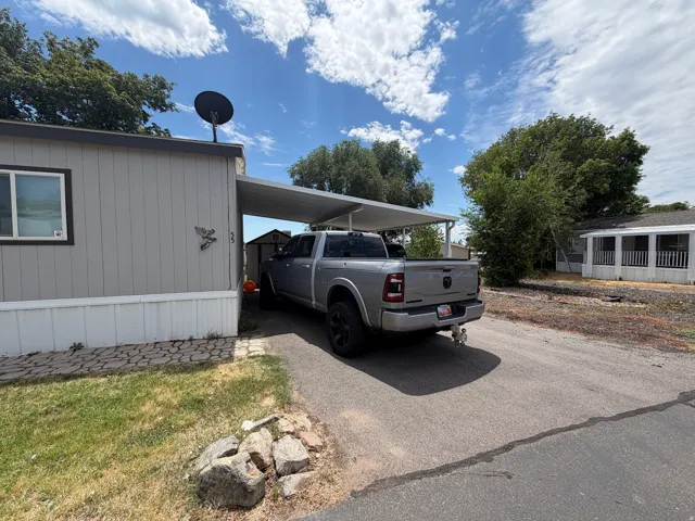 Covered carport parking for vehicle protection
