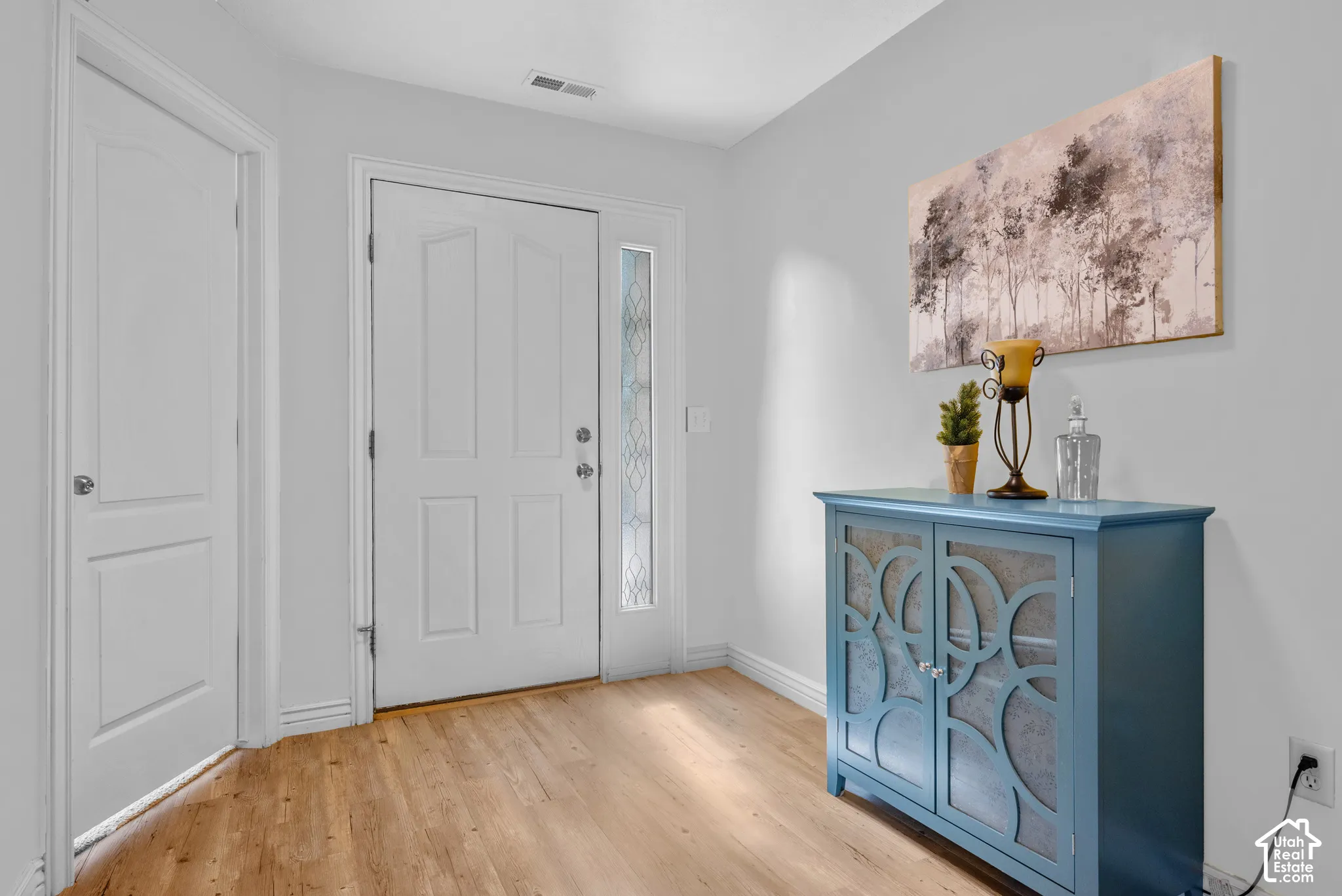 A bright airy entry way welcomes you in to your new home!
