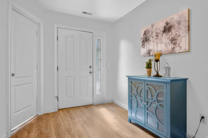 A bright airy entry way welcomes you in to your new home!