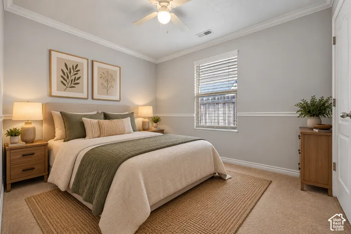 Second Bedroom with neutral-toned walls featuring classic chair rail molding, ceiling-mounted light fixture with integrated fan, window with horizontal blinds, and carpeted flooring. Virtually Staged.