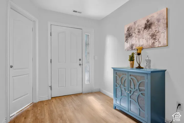 A bright airy entry way welcomes you in to your new home!