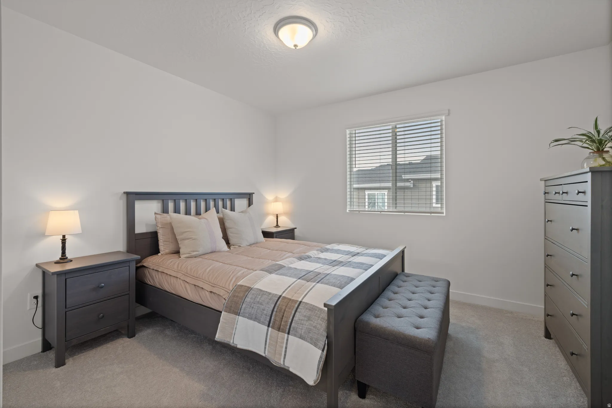 Bedroom 4 with a window featuring horizontal blinds