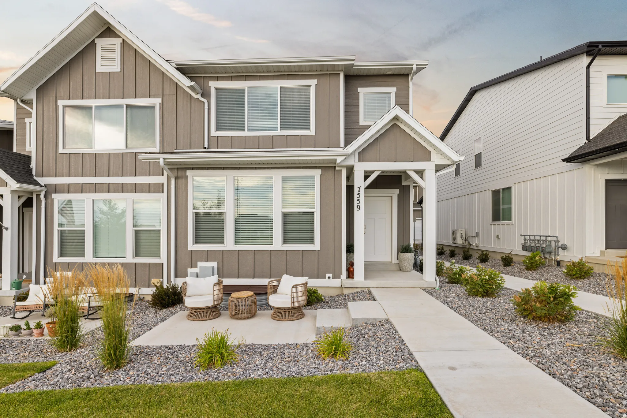 Contemporary multi-level exterior with board and batten siding