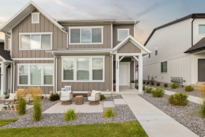 Contemporary multi-level exterior with board and batten siding
