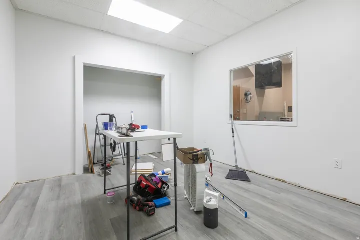 Bright interior space featuring light wood-finish flooring