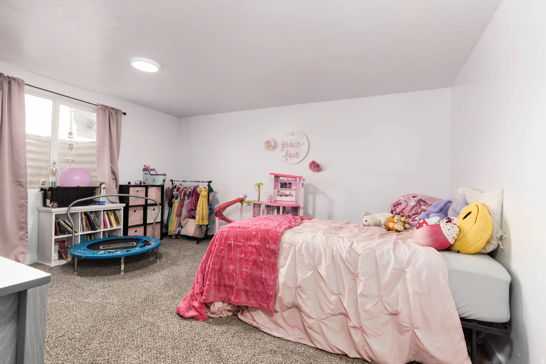 Interior room featuring light gray carpet flooring and white painted walls