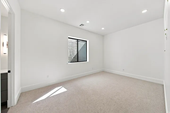 Plush carpeting and recessed lighting