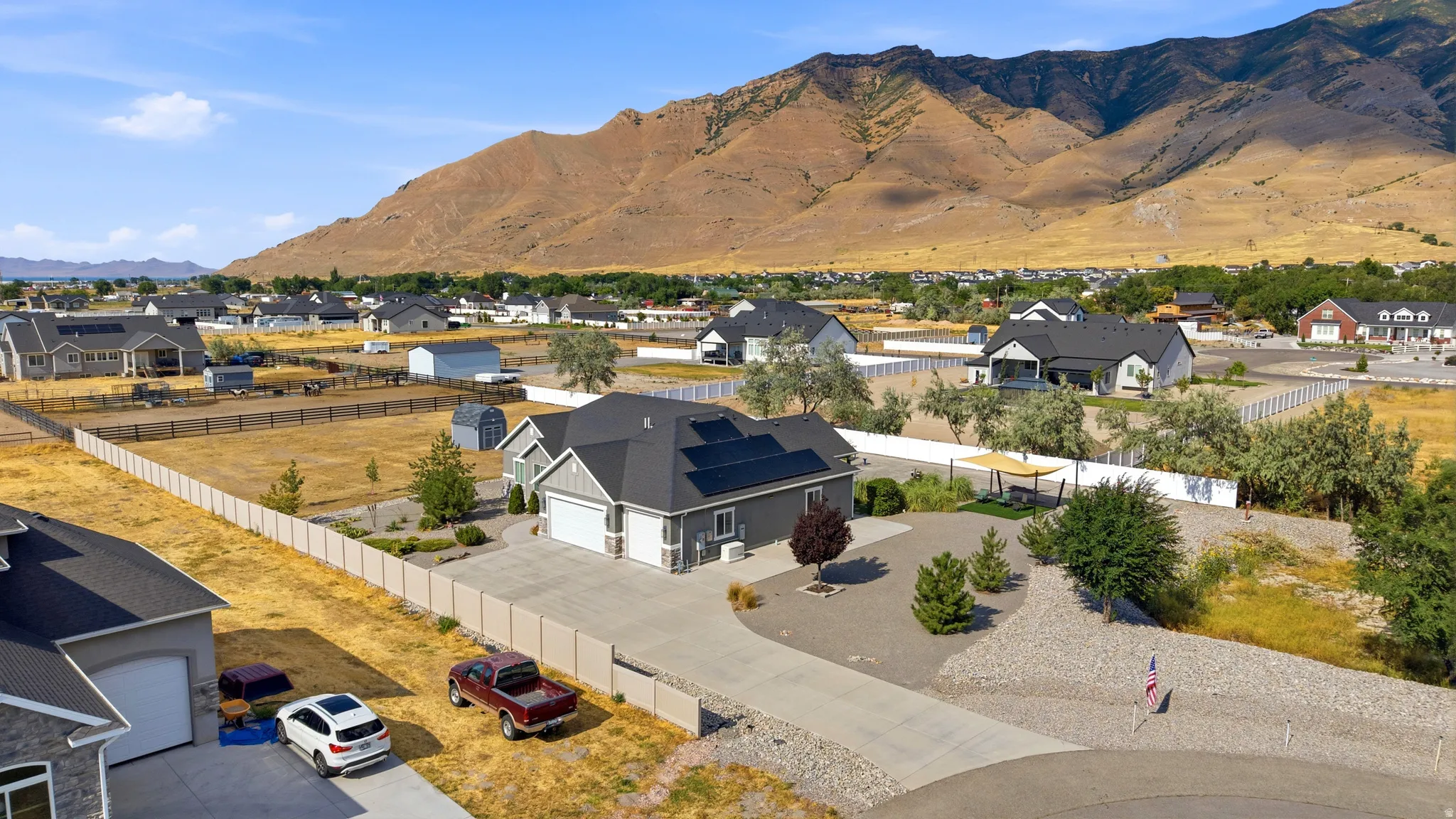 Contemporary single-story residence featuring a two-car garage and a paved driveway