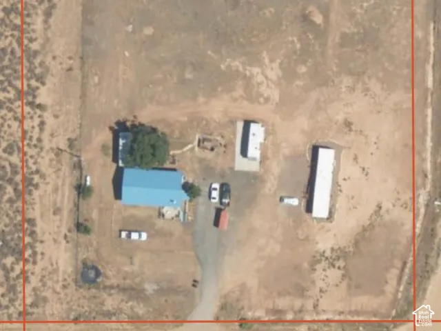 Aerial Property View. Displaying an overhead perspective of the property and its immediate surroundings