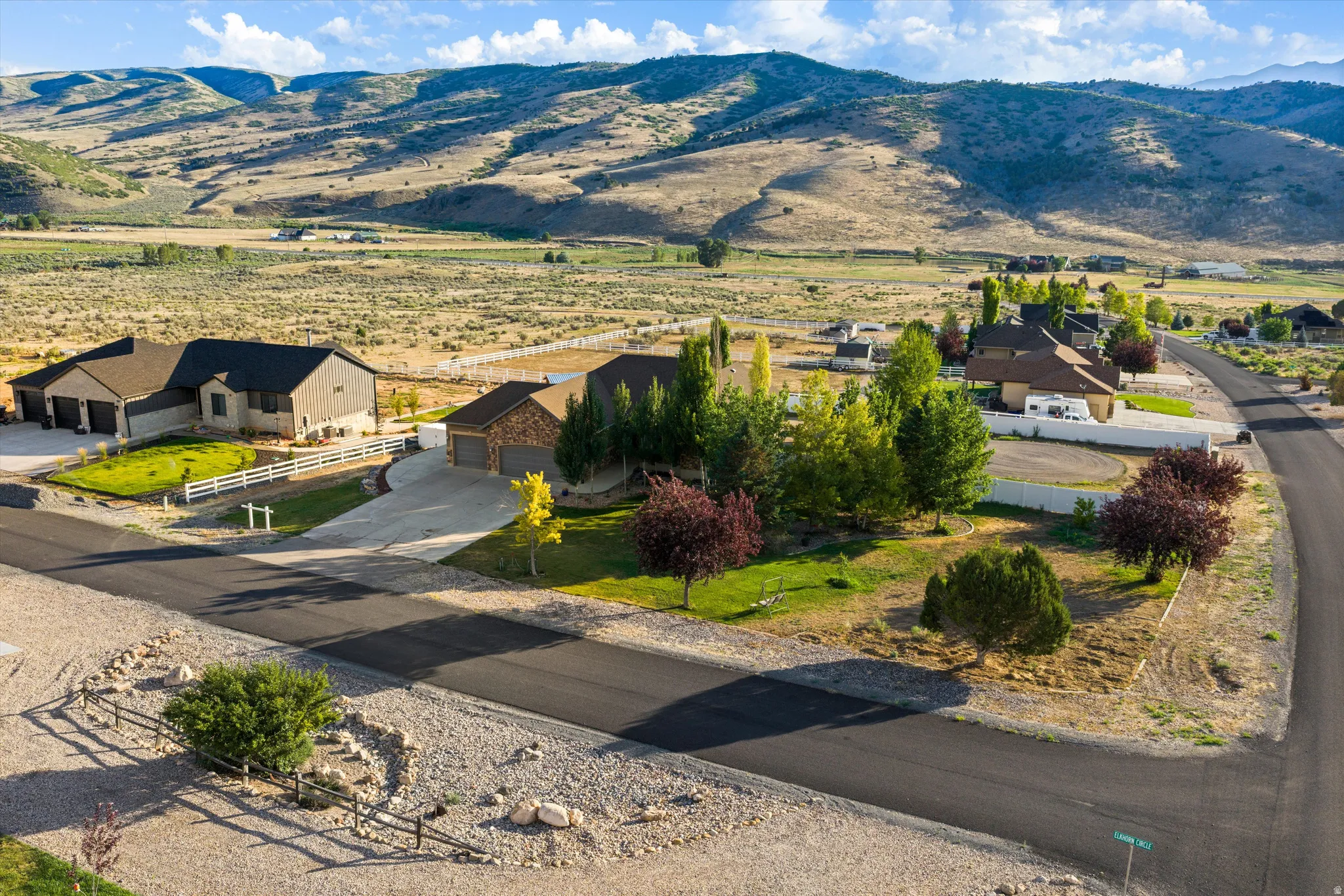 Expansive rural setting with mountain backdrop