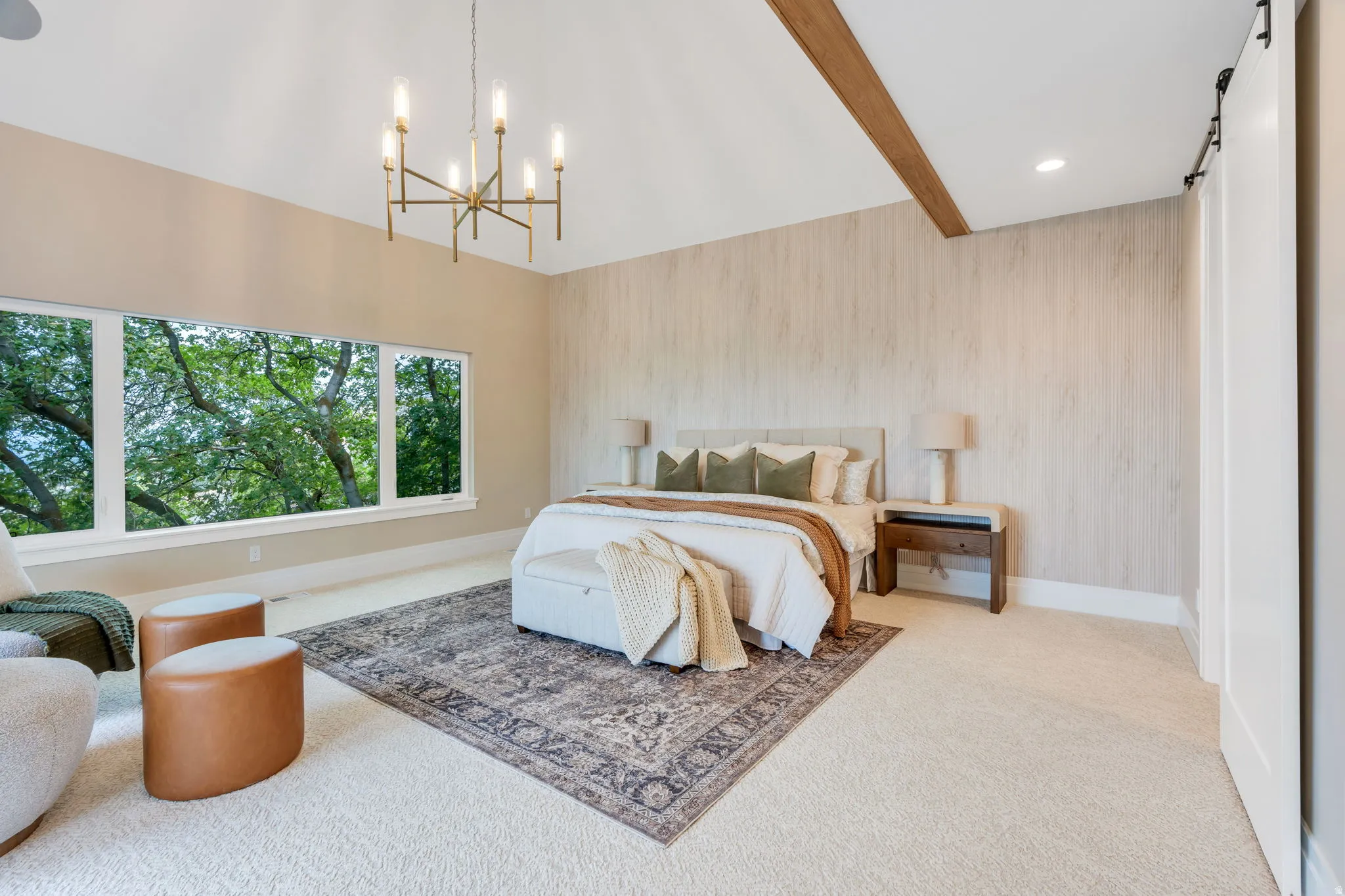 Vaulted ceiling with an exposed wood beam