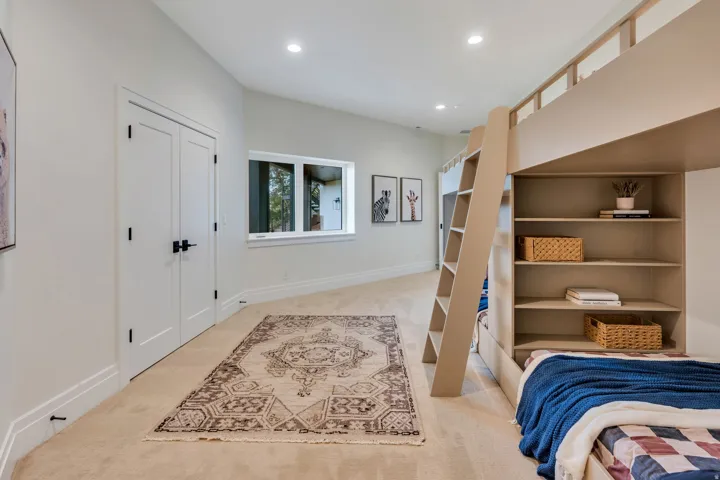 Built-in bunk bed structure with integrated shelving