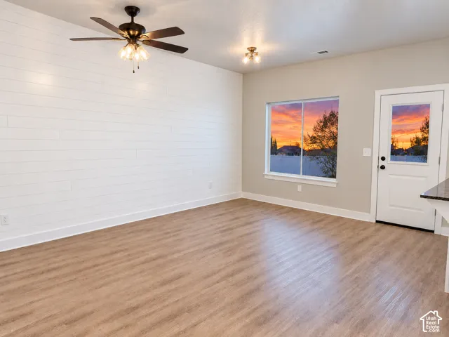 Wood-finish flooring throughout